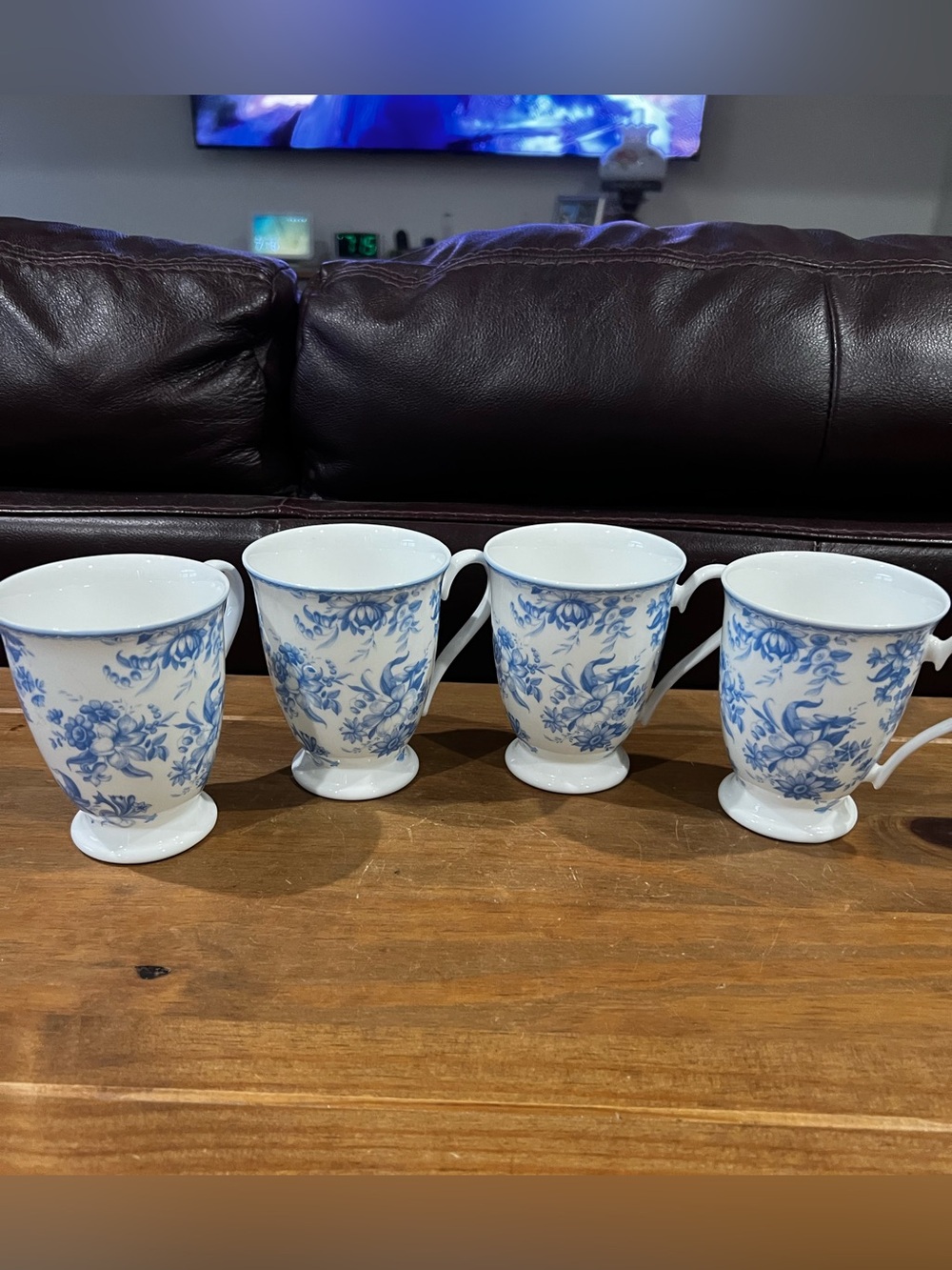 Set of 4 Blue Floral footed bone China tea mugs. Beautiful and never been used.